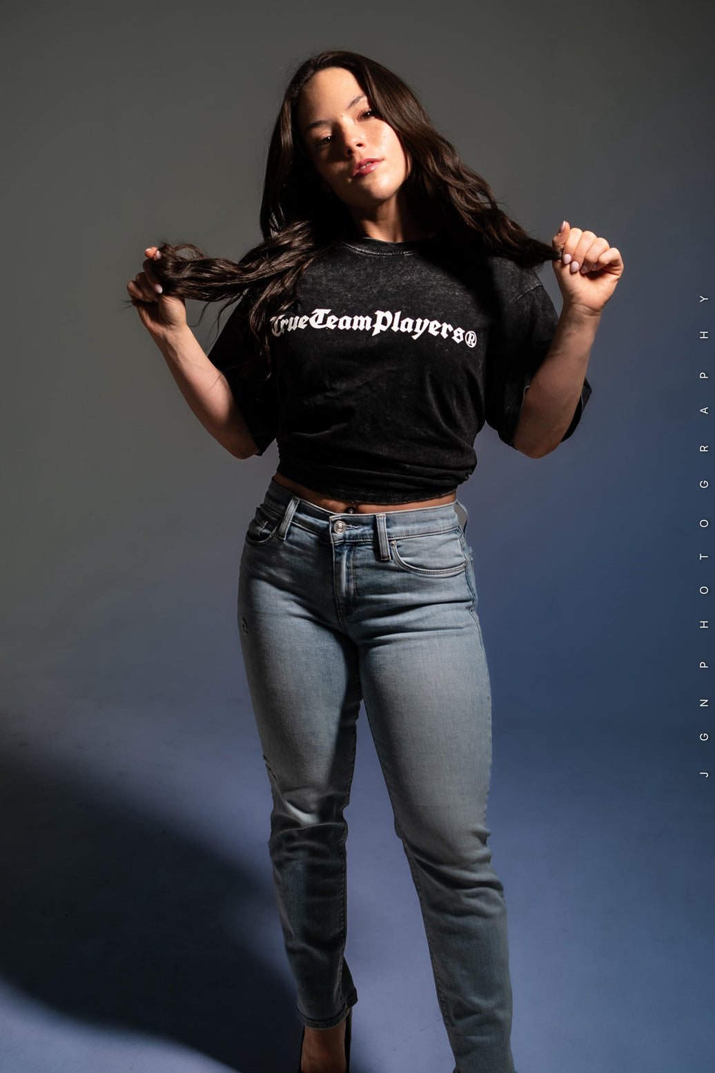 Model wearing the black washed lightweight loose-fit True Team Players t-shirt