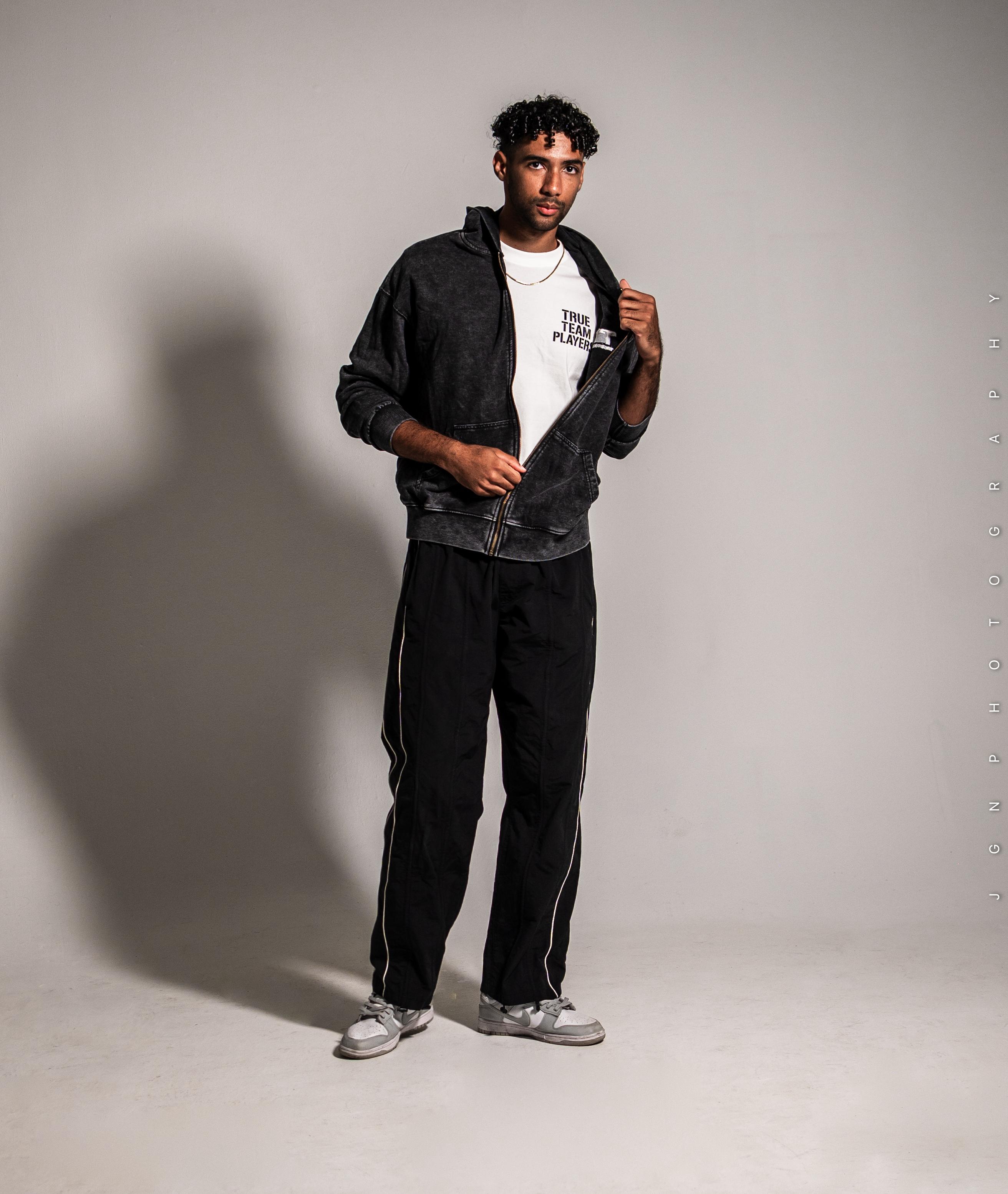 TTP oversized zipper hoodie in Gray worn open over a white tee